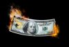 image of money burning to depict just how looney insurance re-marketing is in order to gain an understanding the human psyche of selling